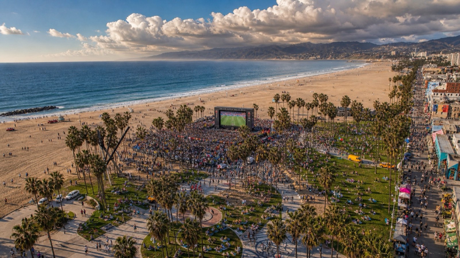 Crowd of fans watching the Fan Zone screen on Venice Beach